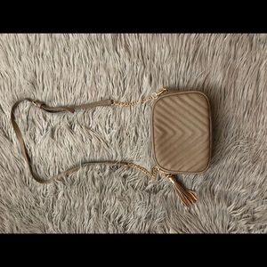 Tan cross body bag